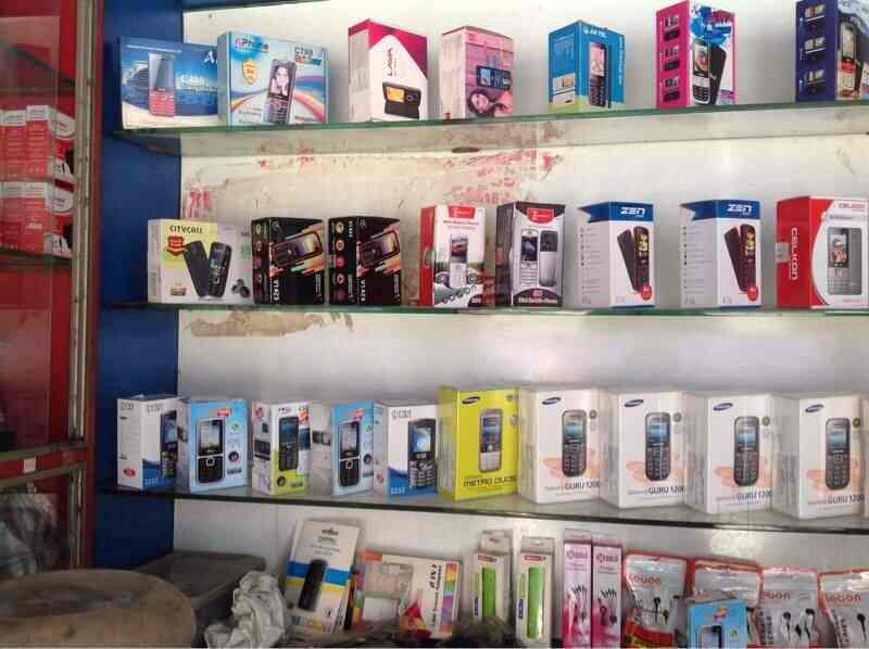 Mobile accessories and service counter inside BBC Mobile Service Center